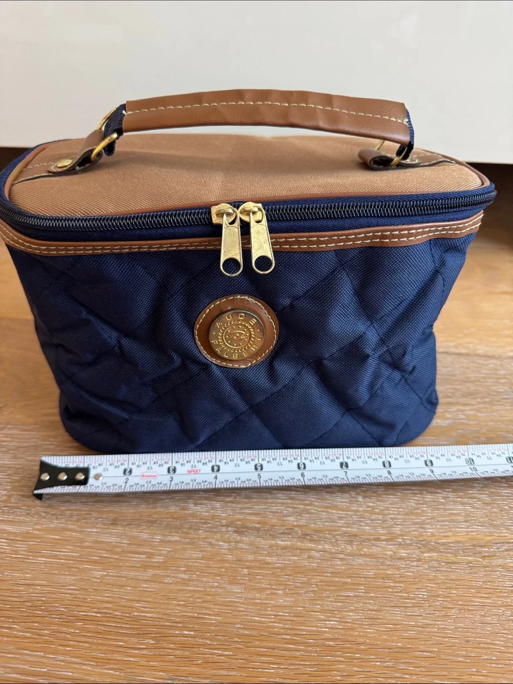 Aude Falbert Navy Quilted Cosmetic Case with Tan Trim and Gold Accents